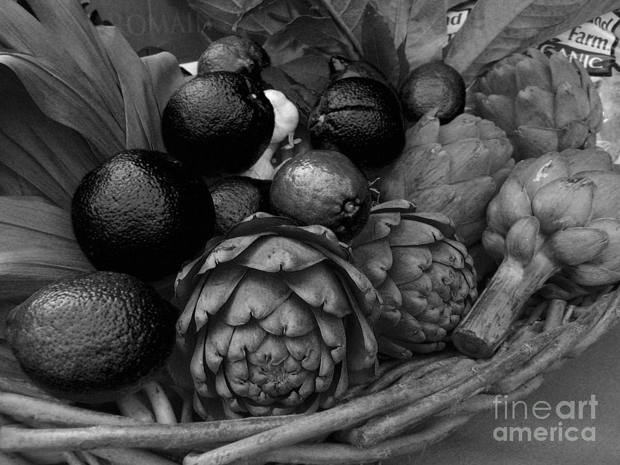 Artichokes With Black Lemons and Oranges Photograph by James B Toy
