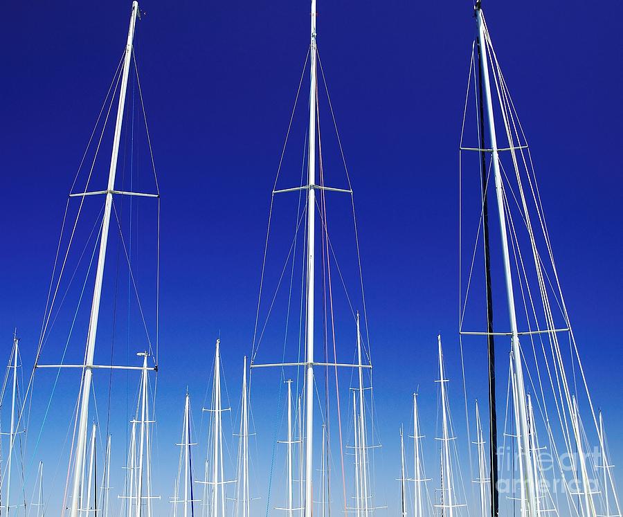 Artistic. Yacht Masts Reaching into a Vivid Blue Sky. Photograph by Geoff Childs