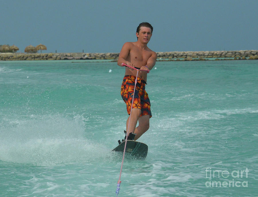 Aruba Wakeboarder with a Jetty in the Background  Photograph by DejaVu Designs