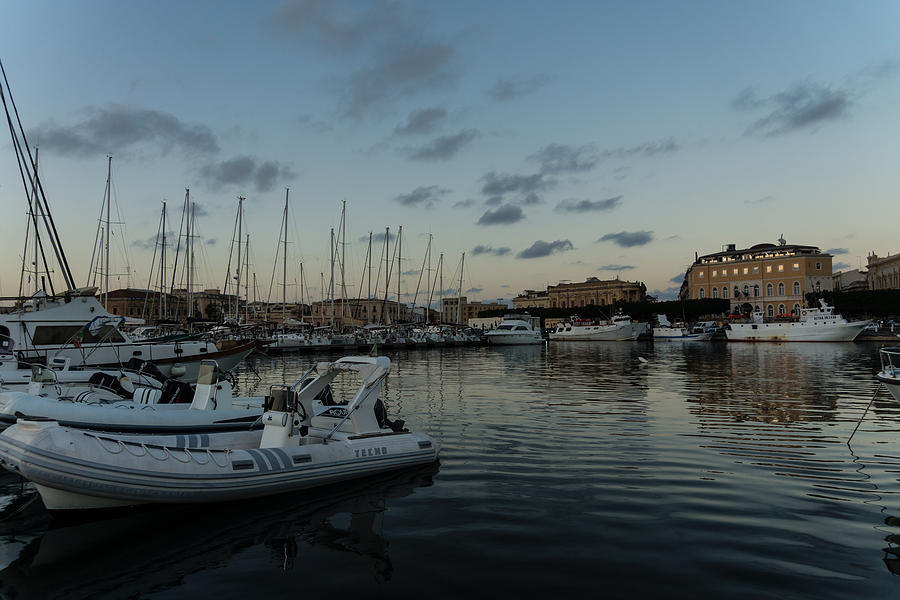 As the Evening Gently Comes - Ortygia Syracuse Sicily Grand Harbor Photograph by Georgia Mizuleva