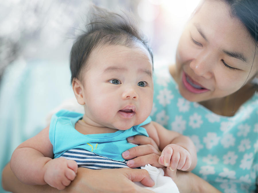 Asian baby and mom Photograph by Anek Suwannaphoom