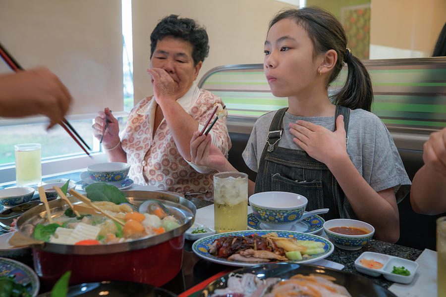 Asian Family party with shaby sukiyaki set manu in restaurant Photograph by Anek Suwannaphoom