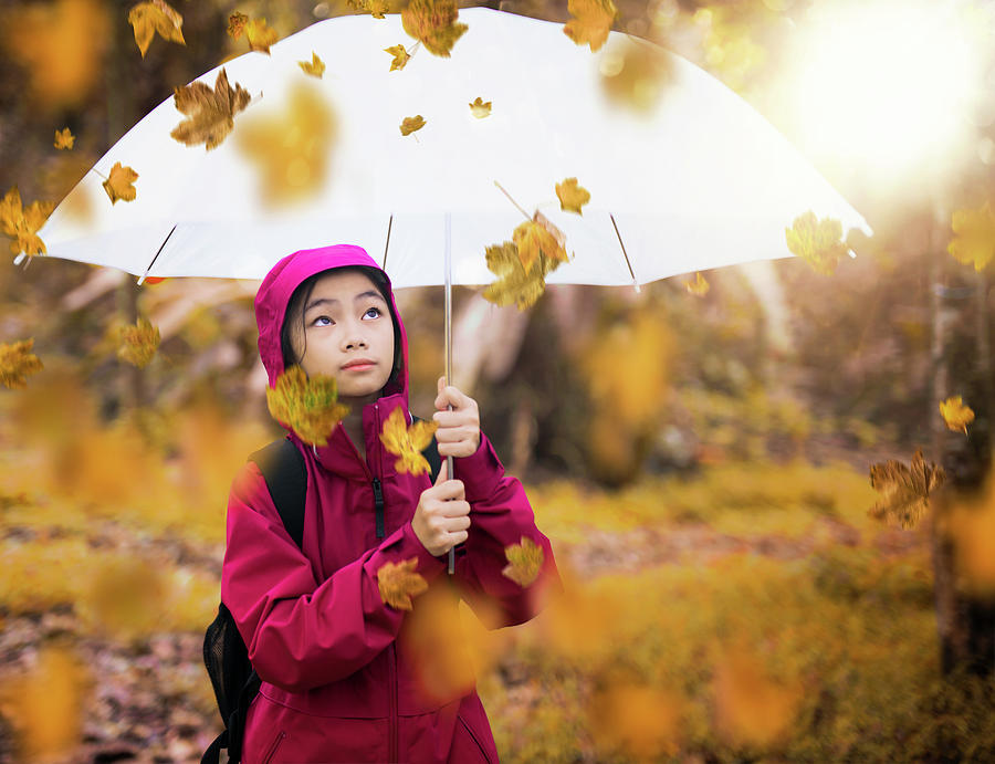 Asian girk with umbrella in autumn gardent Photograph by Anek Suwannaphoom
