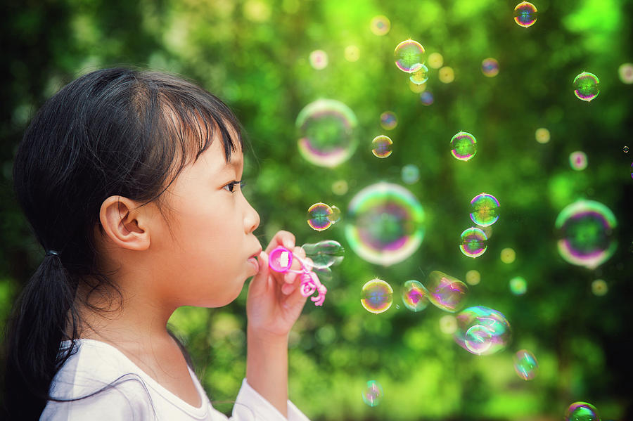 Asian kid play a bubble  Photograph by Anek Suwannaphoom