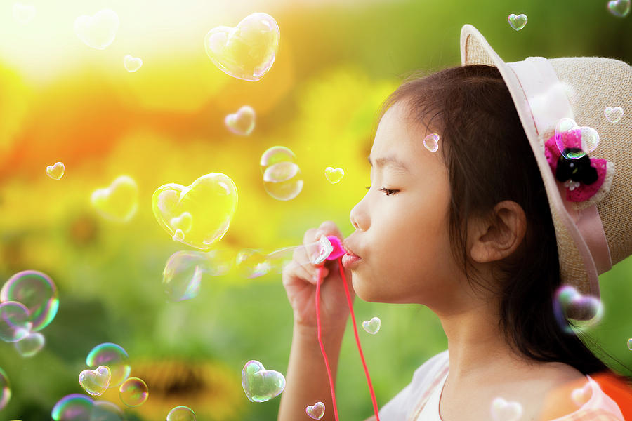 Asian kid play bubble Photograph by Anek Suwannaphoom