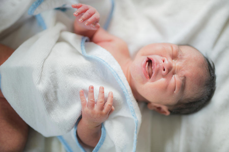 Asian new born baby sleep with crying Photograph by Anek Suwannaphoom