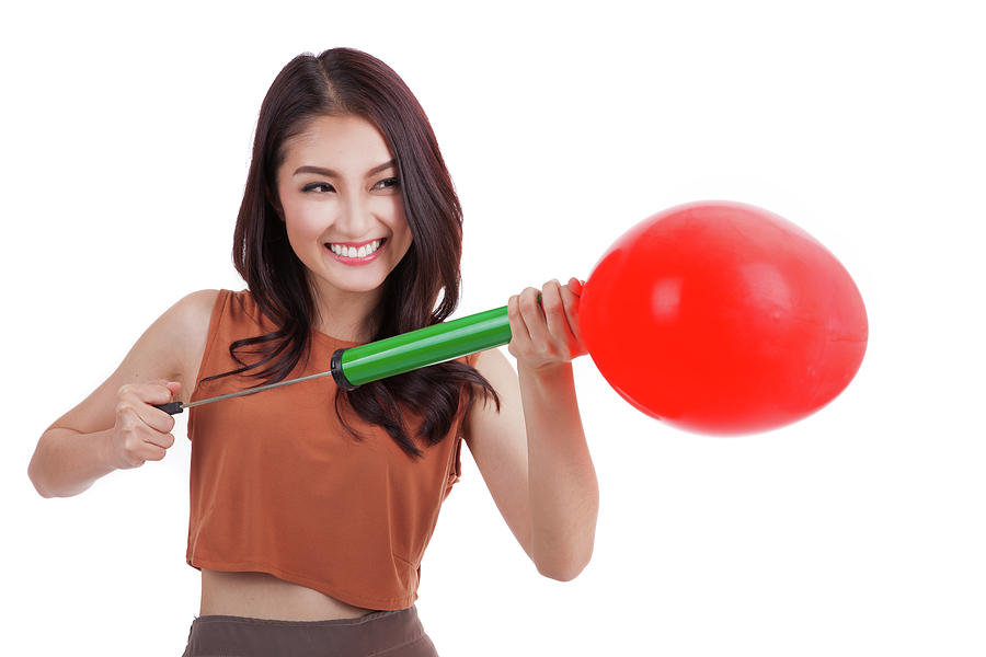 Asian pretty girl and a red heart  balloon Photograph by Anek Suwannaphoom