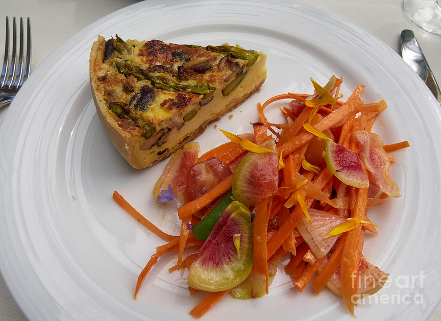 Asparagus and mushroom quiche with a carrot and radish salad Photograph by Louise Heusinkveld