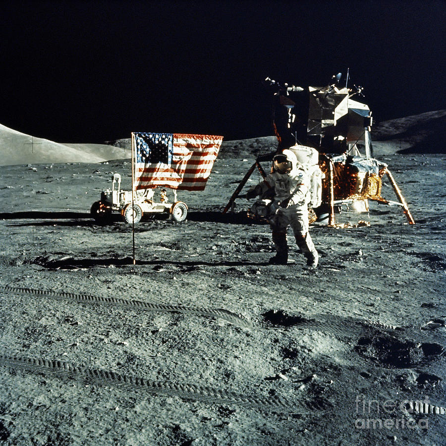 Astronaut And Lunar Module On Moon Photograph by Stocktrek Images