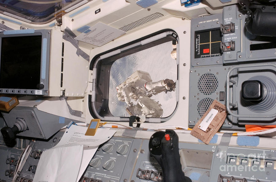 Astronaut Taking Spacewalk Photograph by Nasa