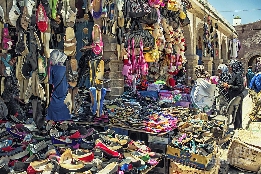 Clothing Photograph - At a Moroccan market by Patricia Hofmeester