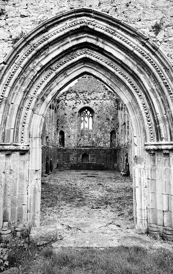 Athassel Priory Tipperary Ireland Medieval Ruins Layered Arched Doorway into Great Hall BW Photograph by Shawn OBrien