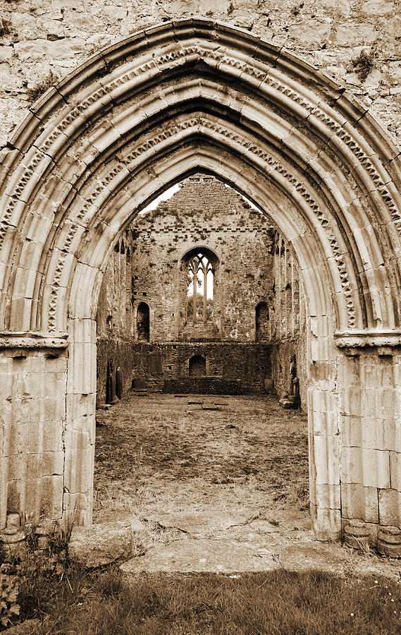 Athassel Priory Tipperary Ireland Medieval Ruins Layered Arched Doorway into Great Hall Sepia Photograph by Shawn OBrien
