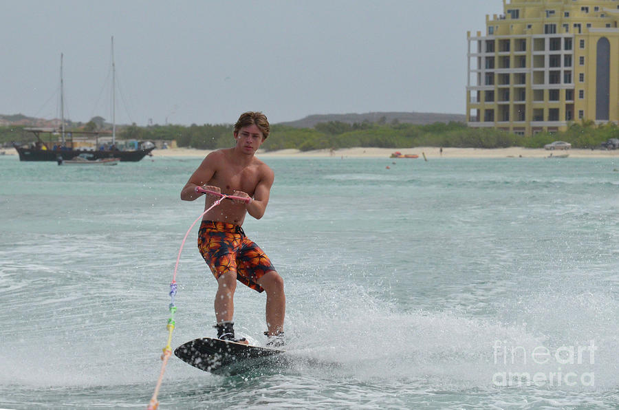 Athletic Wakeboarder Riding a Wakeboard off the Coast of Aruba Photograph by DejaVu Designs