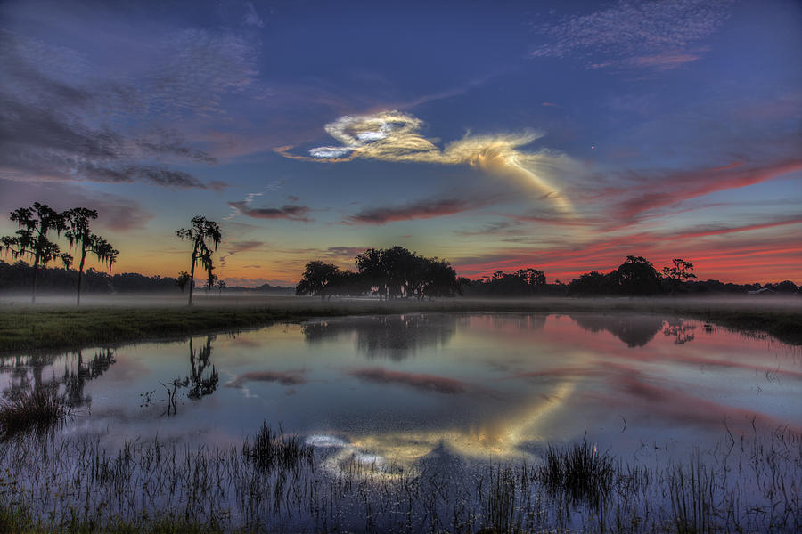 Atlas V rocket launch sunrise Photograph by Justin Battles