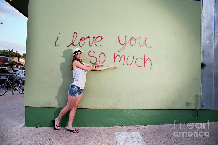 Austin Photograph - Attractive local Austin woman poses in front of the famous I lov by Dan Herron