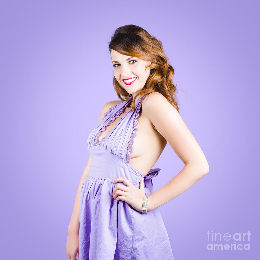 Attractive young pinup girl in retro purple dress Photograph by Jorgo Photography