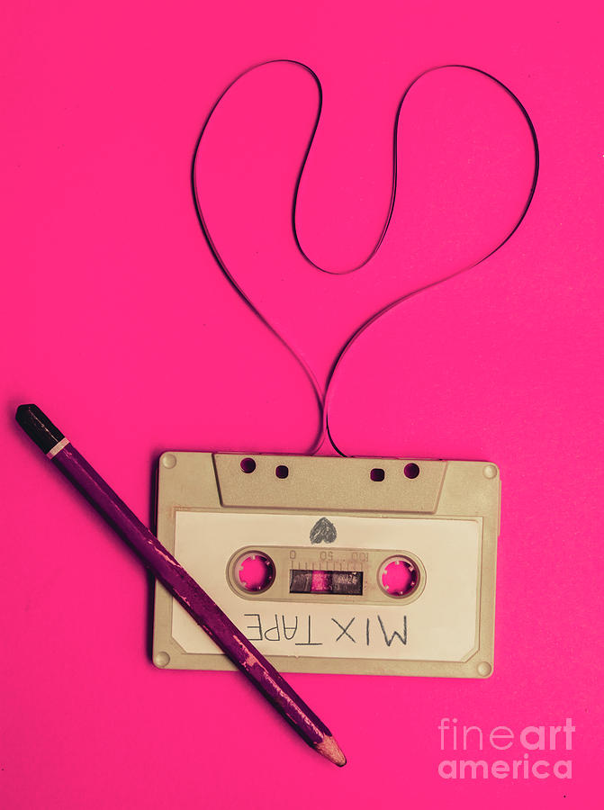 Audio Cassette With Heart Shape Tape On Pink Background Photograph by Jorgo Photography