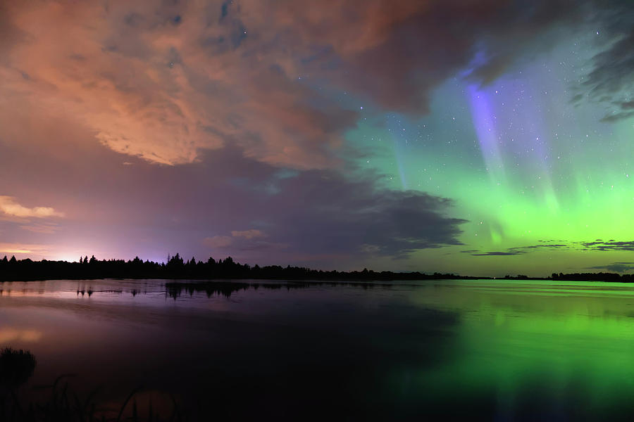 Aurora and Storm Clouds Photograph by Dan Jurak