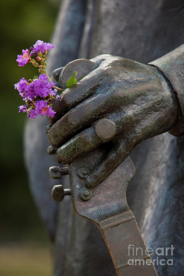 Stevie Ray Vaughan Photograph - Austins Blues Legend Stevie Ray Vaughan Statue with flowers in hand by Dan Herron