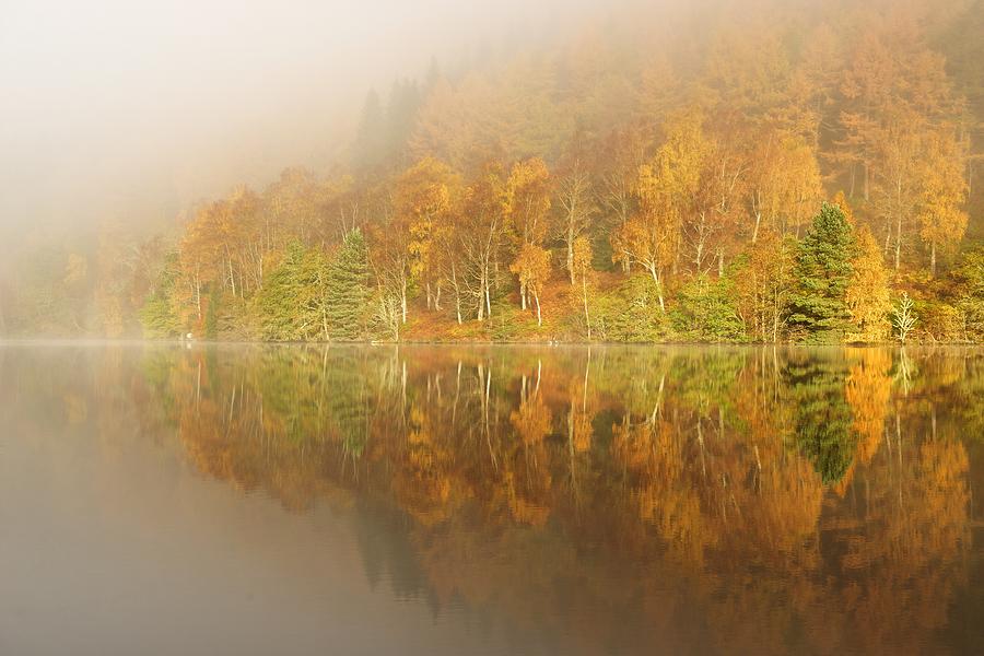 Autumn mist on Loch Tummel Photograph by Stephen Taylor