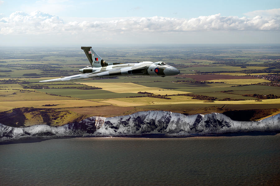 Avro Vulcan over the white cliffs of Dover Photograph by Gary Eason