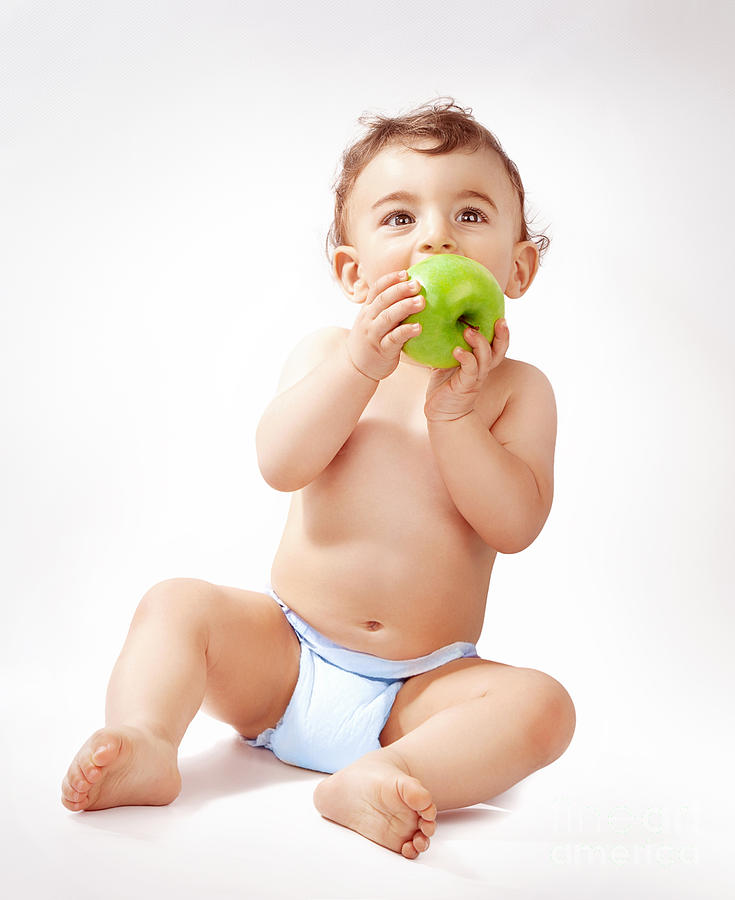 Baby boy eating apple Photograph by Anna Om