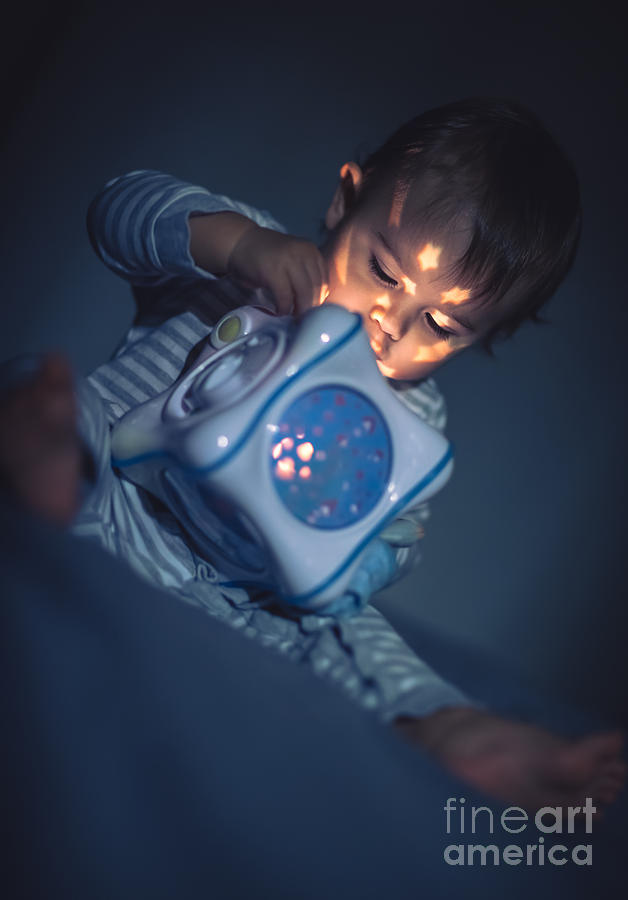 Baby boy with magical toy Photograph by Anna Om