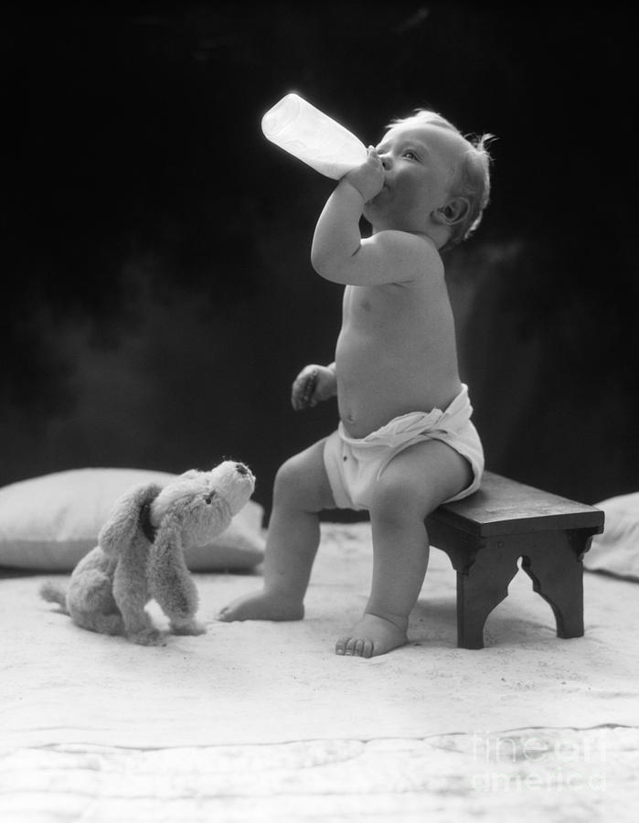 Baby Drinking Milk, 1930s Photograph by H. Armstrong Roberts/ClassicStock