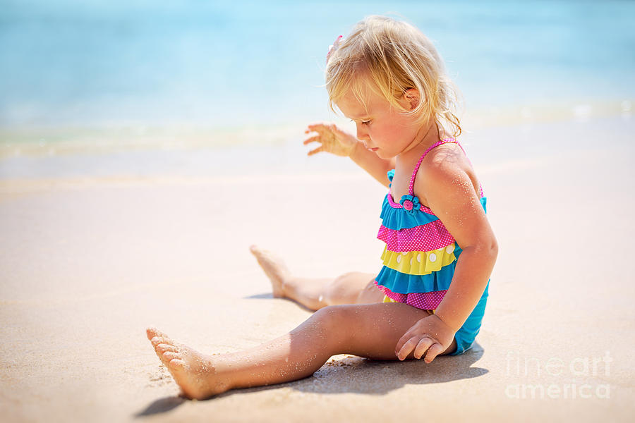 Baby girl playing on the beach Photograph by Anna Om