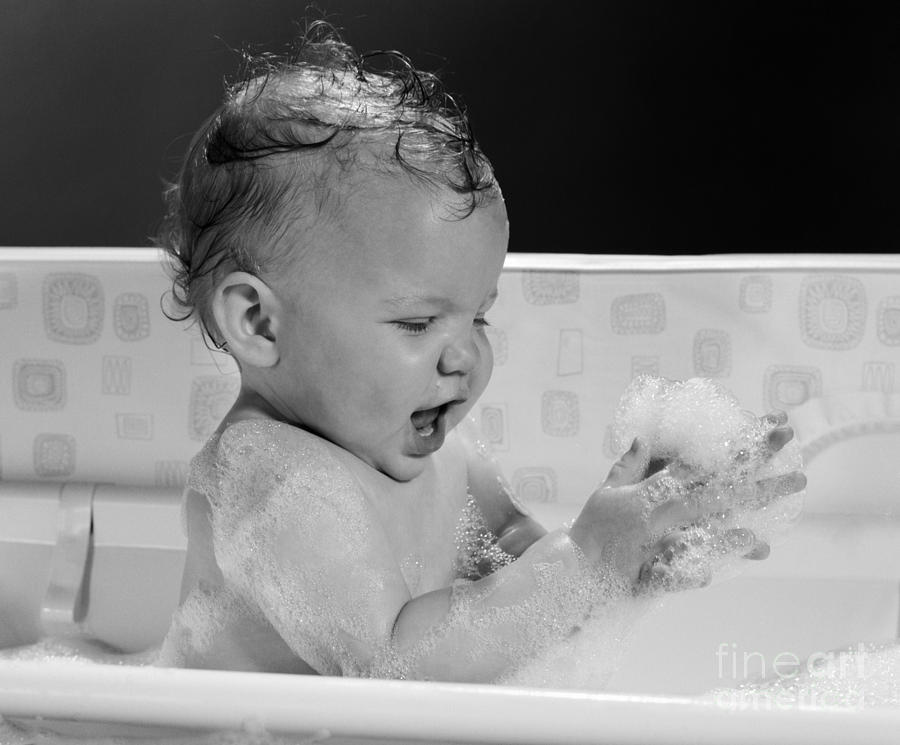 Baby In Bathtub Playing With Suds Photograph by H. Armstrong Roberts/ClassicStock