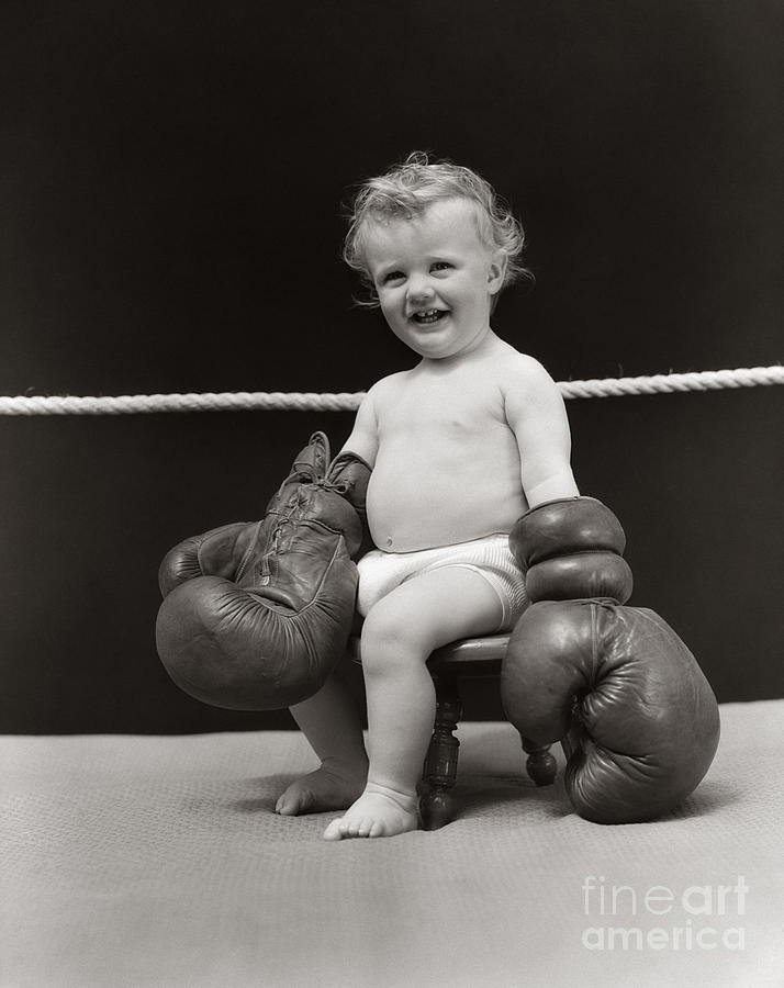 Baby In Boxing Gloves, C. 1930s Photograph by H. Armstrong Roberts/ClassicStock