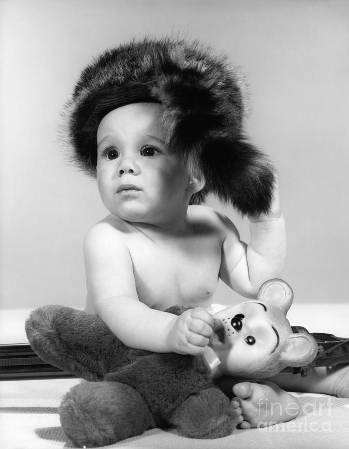 Animal Photograph - Baby In Coonskin Hat, C.1960s by H. Armstrong Roberts/ClassicStock