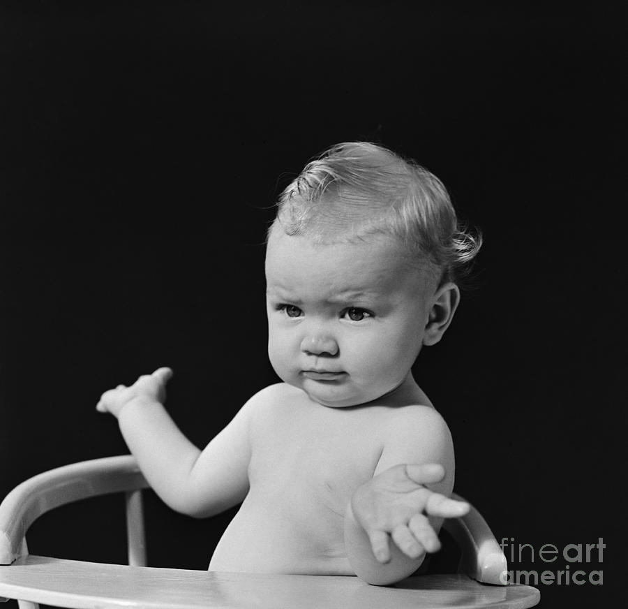 Baby In High Chair Shrugging, C.1930-40s Photograph by H. Armstrong Roberts/ClassicStock