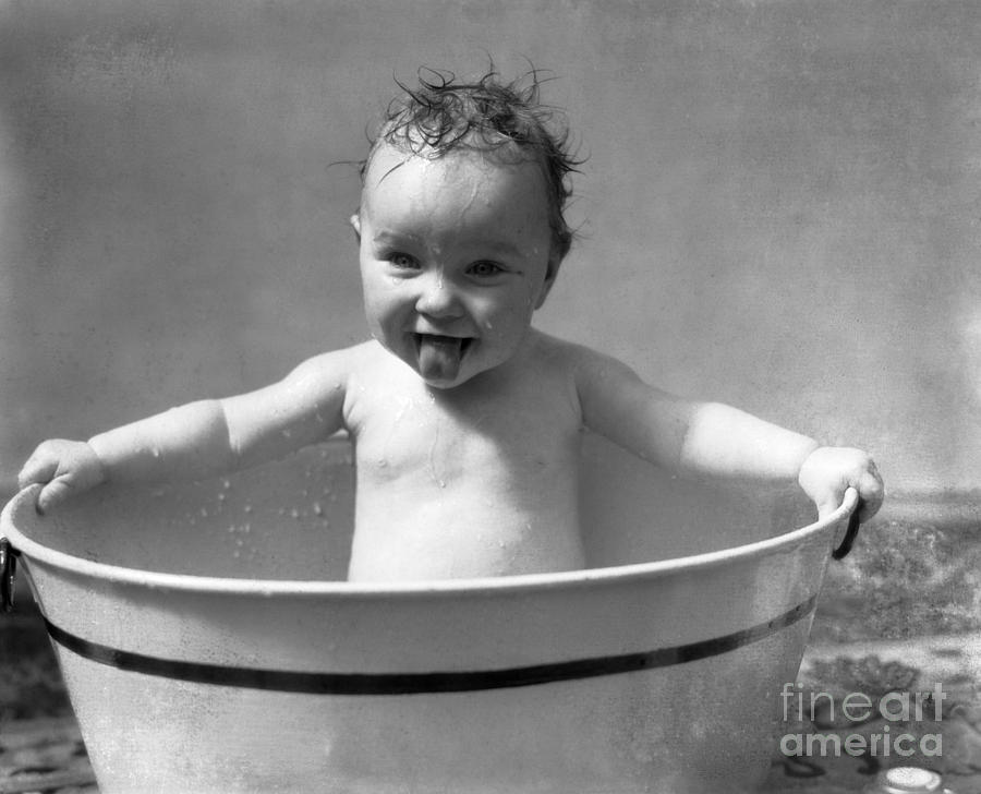 Baby In Washtub Sticking Out Tongue Photograph by H. Armstrong Roberts/ClassicStock