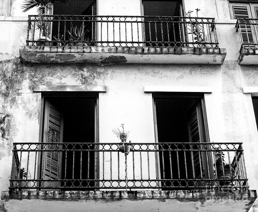 Baby on the Balcony in San Juan Photograph by John Rizzuto