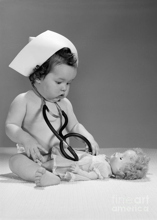 Baby Playing Doctor, C. 1960s Photograph by H. Armstrong Roberts/ClassicStock