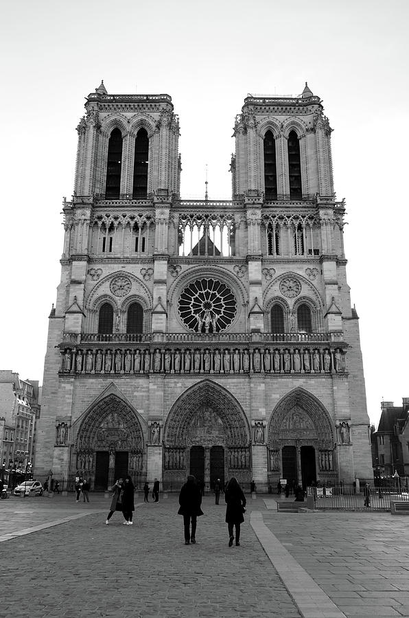 Backlit Front Facade of the Magnificent Notre Dame Cathedral Paris France Black and White Photograph by Shawn OBrien