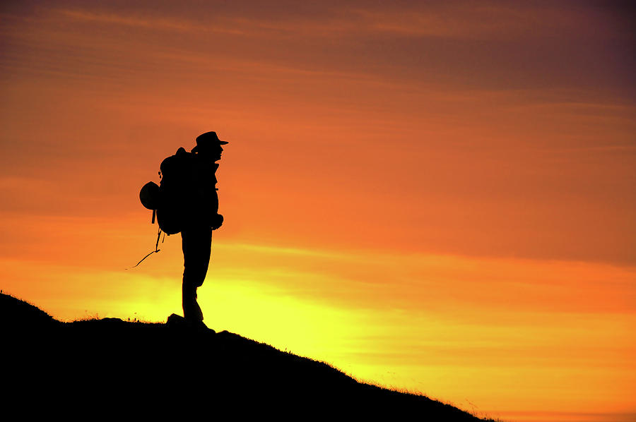 Backpacker Silhouette On The Hill At Sunset Photograph By Dimitrije