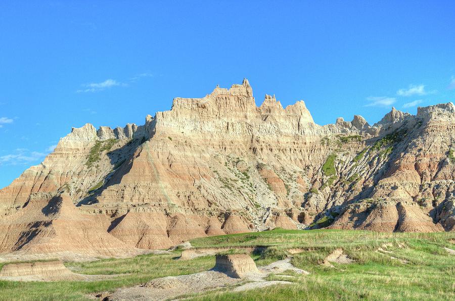 Badlands Photograph - Badlands with blue sky by Cynthia Kidwell