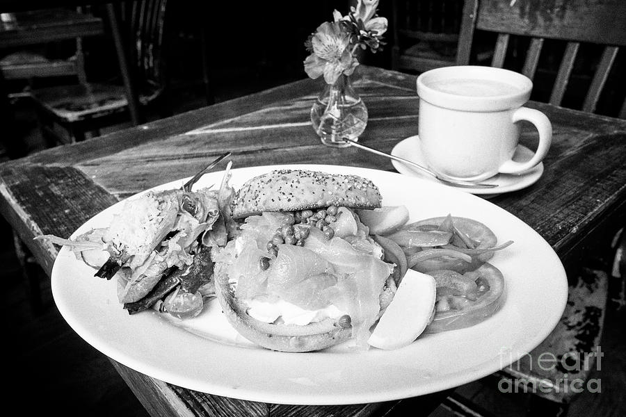 City Photograph - bagel with cream cheese and smoked salmon lunch with coffee in a restaurant in New York City USA by Joe Fox