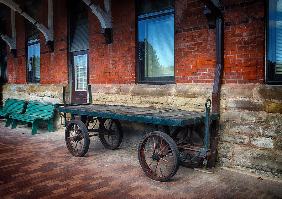 Baggage Cart Outside a Historical Train Staion Photograph by Dick Pratt