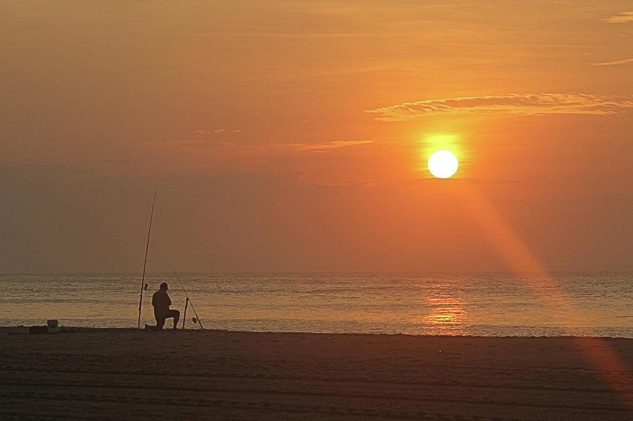 Baiting The Hook At Sunrise Photograph by Robert Banach