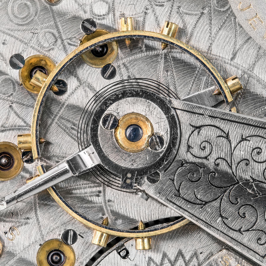 Balance wheel of an antique pocketwatch Photograph by Jim Hughes