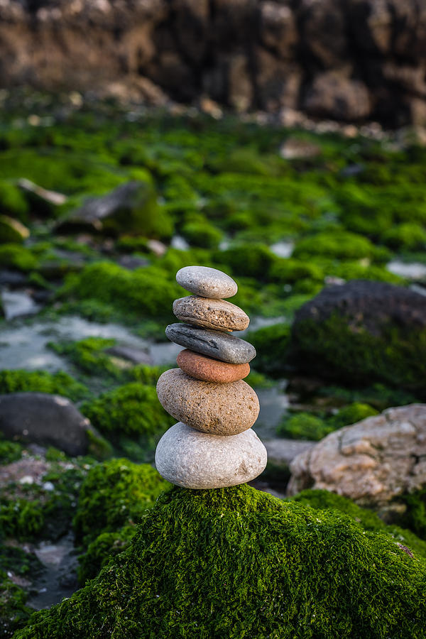 Balancing Zen Stones By The Sea II Photograph by Marco Oliveira