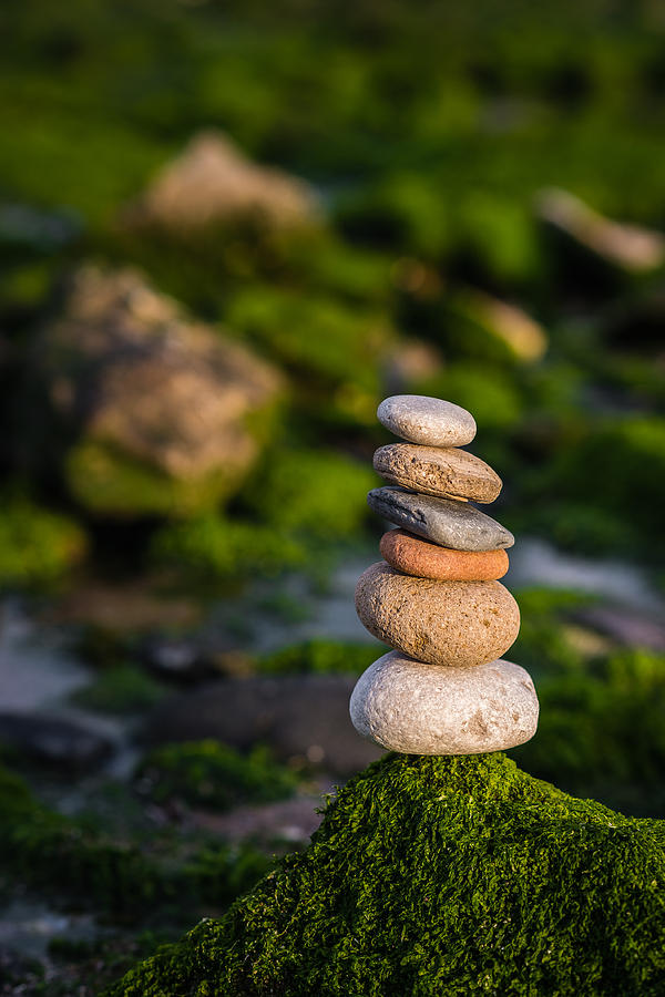Balancing Zen Stones By The Sea Photograph by Marco Oliveira
