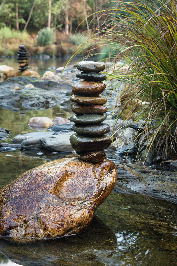 Nature Photograph - Balancing Zen Stones In Countryside River VI by Marco Oliveira