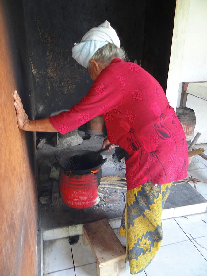 Unschooling Photograph - Balinese lady roasting coffee leans again wall by Exploramum Exploramum Unschooling Photograph - Balinese lady roasting coffee leans again wall by Exploramum Exploramum