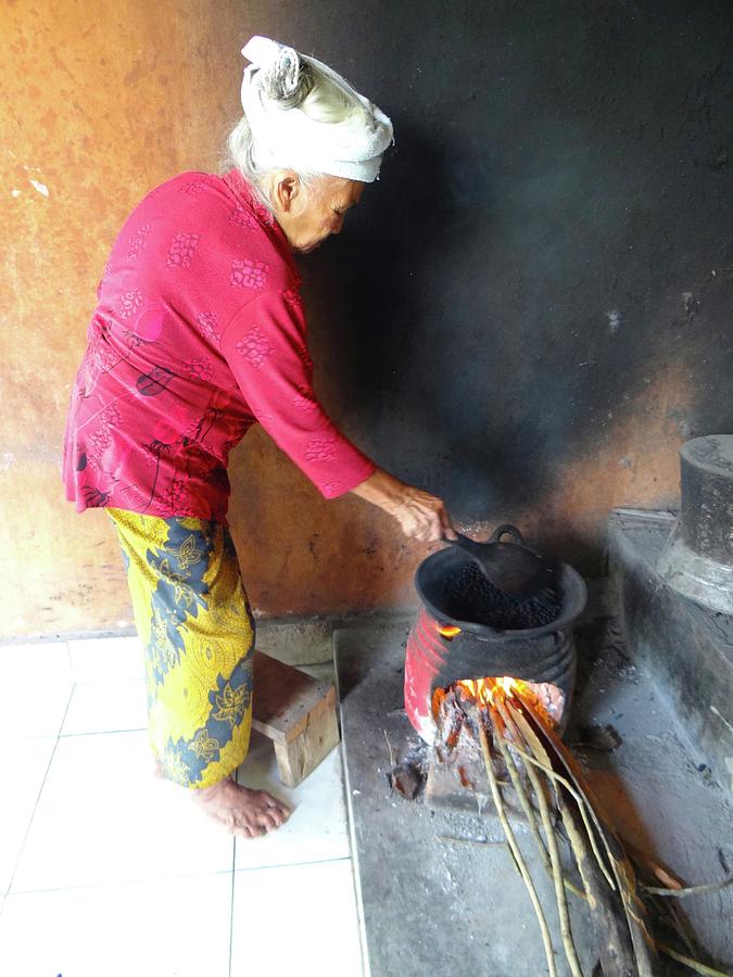 Unschooling Photograph - Balinese lady roasting coffee over the fire by Exploramum Exploramum Unschooling Photograph - Balinese lady roasting coffee over the fire by Exploramum Exploramum