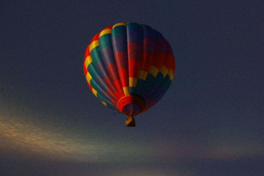 Sports Photograph - Balloon overhead by Jeff Swan